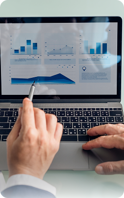 Consultants reviewing printed analytics reports